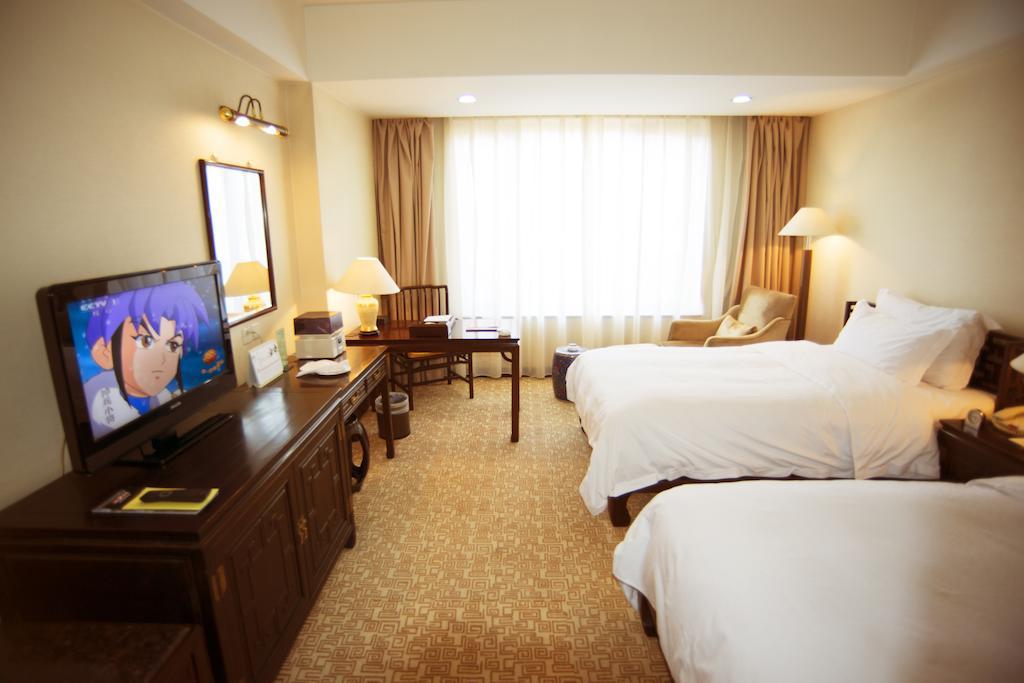 Datong Garden Hotel Ruang foto